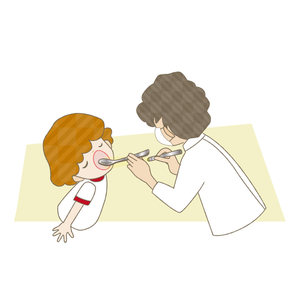 歯の定期検診を受ける子ども